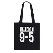 Black tote bag with 'I'm Not 9-5' text on a white background